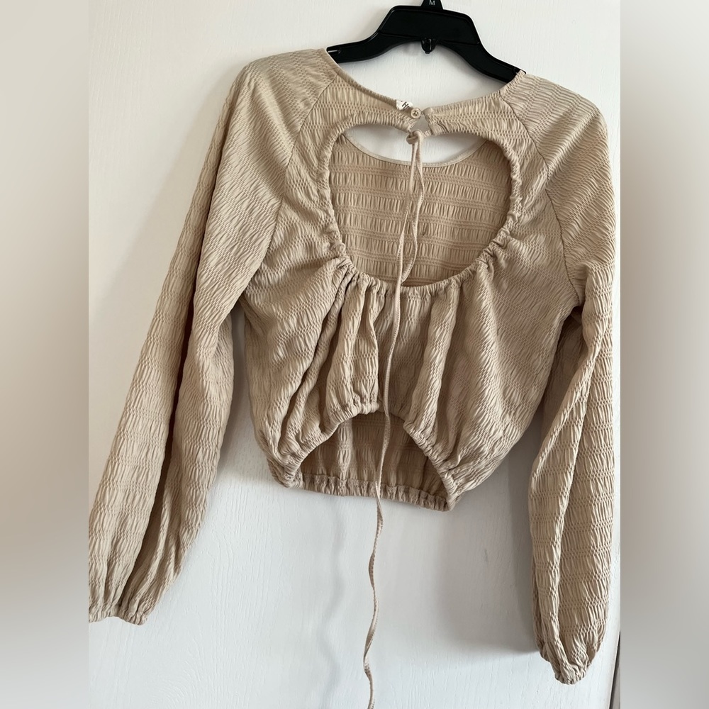 cream color shirt /the pants are a Large and the shirt is a medium
